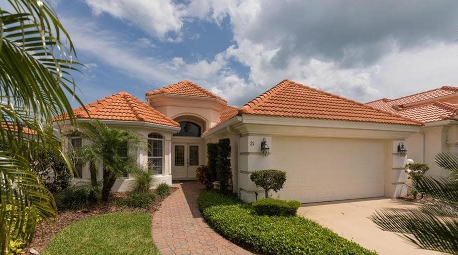 This lakeside house on La Costa Place in the Hammock was built in 2003 and sold recently for $945,000. It has three bedrooms and 2 1/2 baths in 2,428 square feet of living space. It also has an office/den and a screened pool and lanai with a summer kitchen.