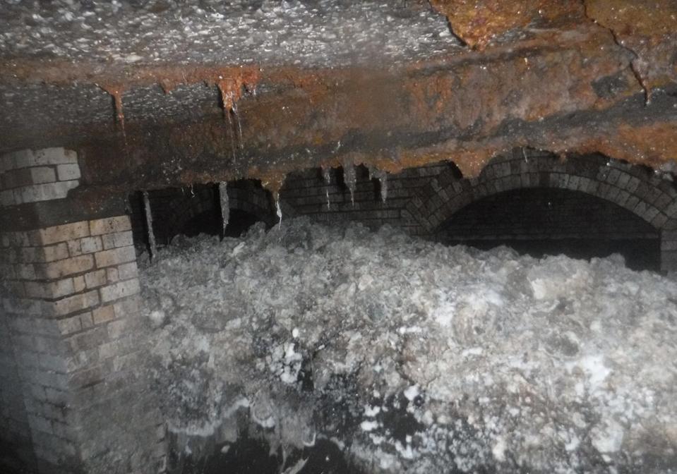 A giant “fatberg” mass of hardened fat, oil and baby wipes, measuring 64 metres long, has been found blocking a sewer in southwestern England. Source: South West Water via AP