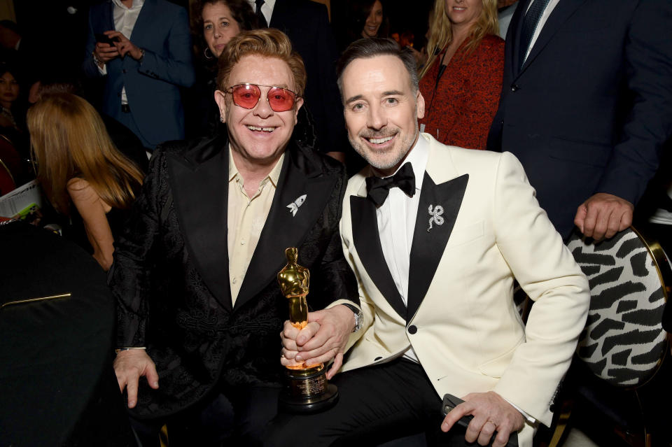 WEST HOLLYWOOD, CALIFORNIA - FEBRUARY 09: (L-R) Winner of Academy Award for Best Original Song from "Rocketman" Elton John and David Furnish attend the 28th Annual Elton John AIDS Foundation Academy Awards Viewing Party sponsored by IMDb, Neuro Drinks and Walmart on February 09, 2020 in West Hollywood, California. (Photo by Michael Kovac/Getty Images for EJAF)