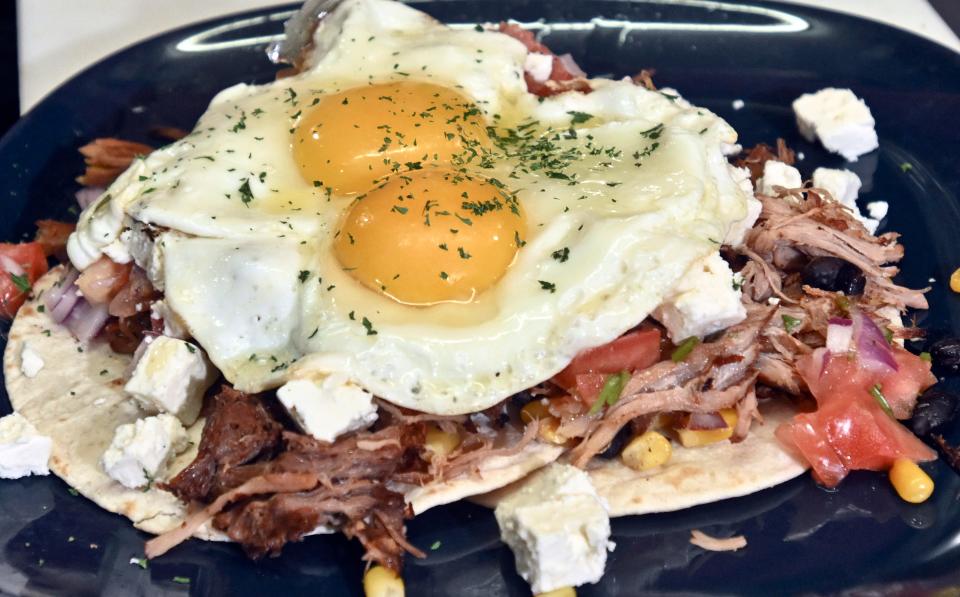 Pulled Pork Huevos Rancheros at the Fig Tree Cafe can be ordered with chicken eggs or duck eggs.