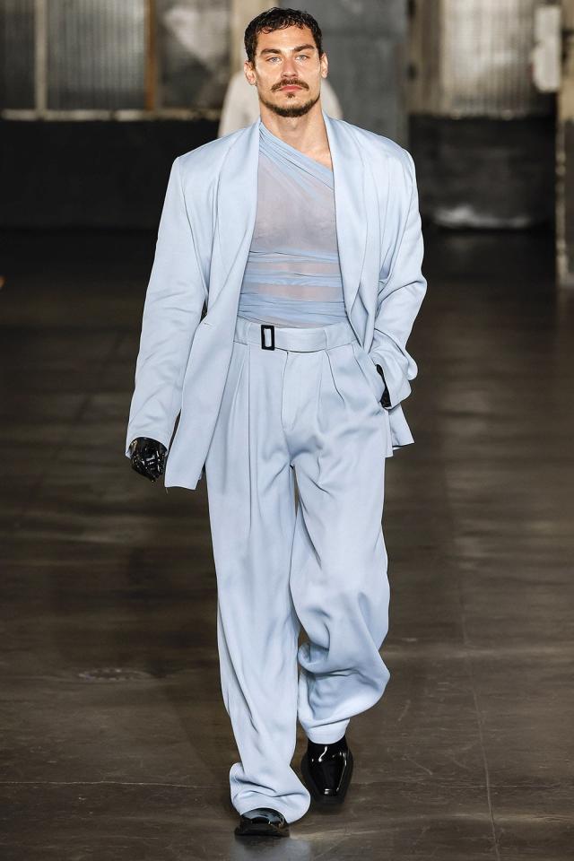 Paris Fashion Week 2023: 4 menswear highlights for AW23/24, from Emily in  Paris' Lucas Bravo on LGN's American Psycho-themed catwalk and Givenchy  minimalism, to Matrix-style coats with Saint Laurent