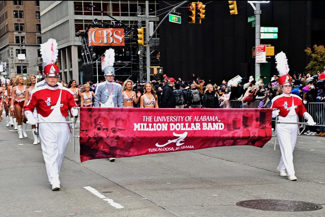 The University of Alabama's Million Dollar Band performed Thursday in New York City as part of the 95th Macy's Thanksgiving Day Parade. [Photo by Jason Mun/groupphotos.com]