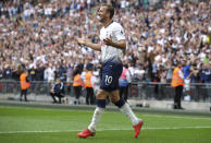 Tottenham Hotspur's Harry Kane celebrates scoring his side's second goal of the game against Fulham during the English Premier League soccer match at Wembley Stadium in London, Saturday Aug. 18, 2018. After 15 games and more than 1,000 minutes, Harry Kane has finally scored a Premier League goal. (Nick Potts/PA via AP)