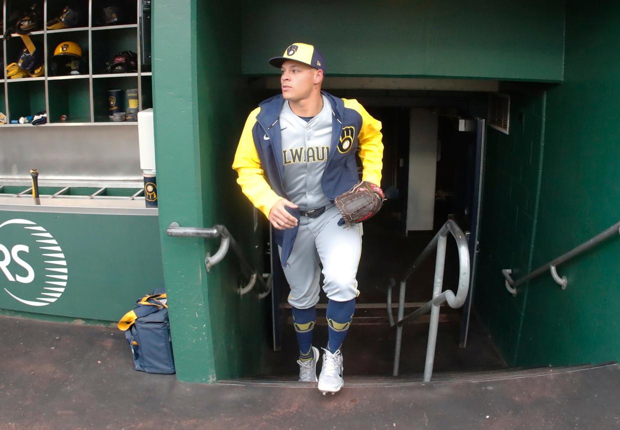 Apr 23, 2024; Pittsburgh, Pennsylvania, USA; Milwaukee Brewers starting pitcher Tobias Myers (36) enters the dugout before making his major league debut against the Pittsburgh Pirates at PNC Park. Mandatory Credit: Charles LeClaire-USA TODAY Sports