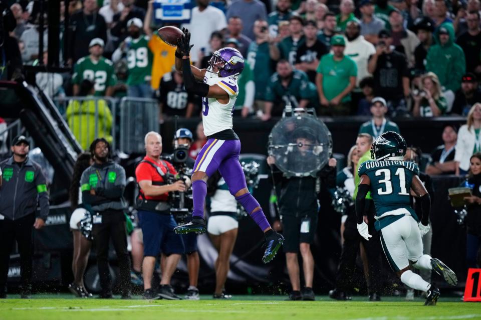 Minnesota Vikings wide receiver Justin Jefferson (18) catches a pass in front of Philadelphia Eagles cornerback Mario Goodrich (31) during the second half of a game Thursday, Sept. 14, 2023, in Philadelphia.