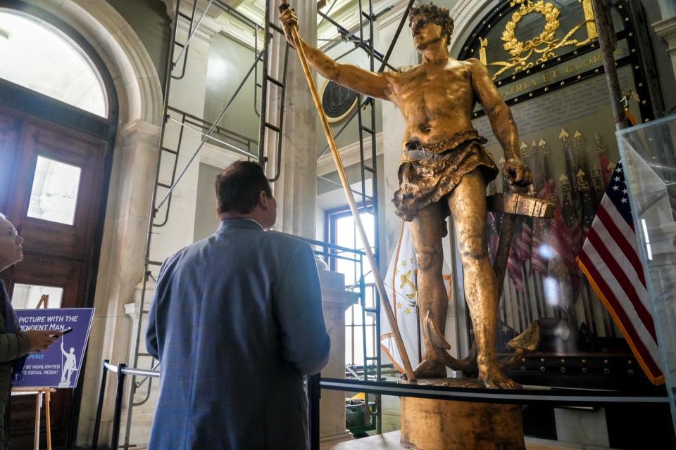 House Speaker K. Joseph Shekarchi takes his final look.