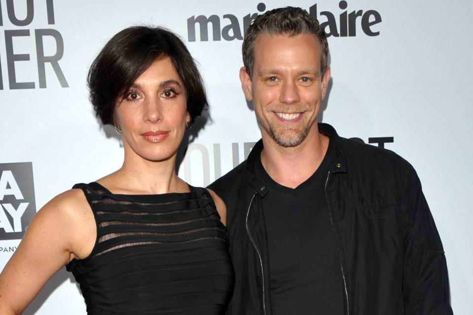 Cybele Chivian (L) and Adam Pascal arrive at the premiere of "Our Idiot Brother" hosted by The Weinstein Company and Ron Burkle held at ArcLight Cinemas on August 16, 2011 in Hollywood, California.