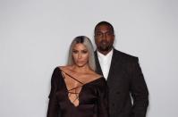 <p>Kim and Kanye looked so chic as they posed together in the photo-booth.</p>