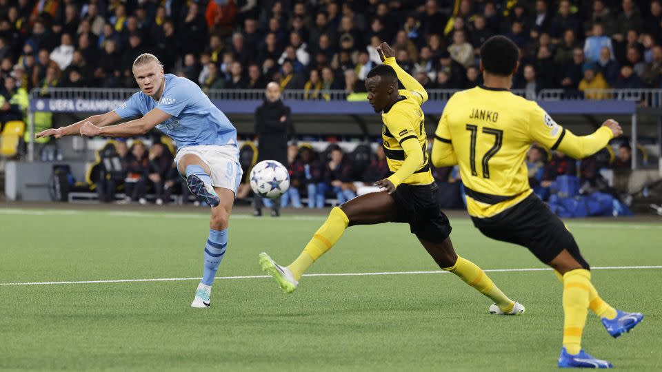 Haaland tucks away his second of the evening. - Stefan Wermuth/Reuters