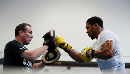 Boxing - Anthony Joshua Media Session - Sheffield, Britain - March 21, 2018 Anthony Joshua and trainer Robert McCracken during the media session Action Images via Reuters/Andrew Couldridge