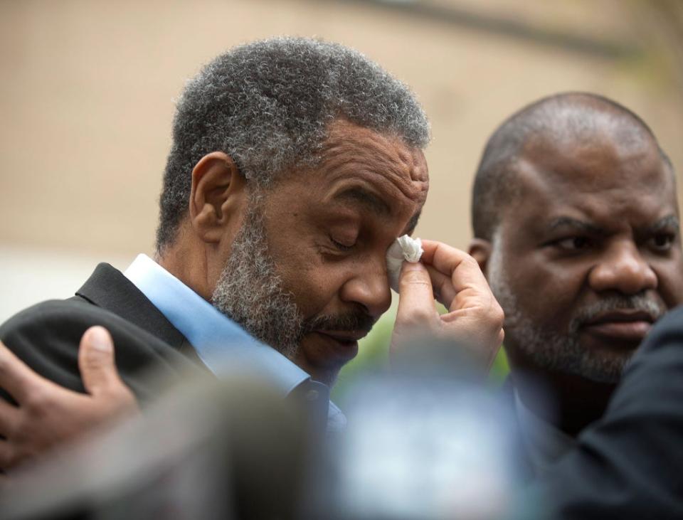 Anthony Ray Hinton wipes away tears outside the Jefferson County jail upon his release after serving 28 years on death row (EPA)