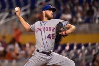 Aug 10, 2018; Miami, FL, USA; New York Mets starting pitcher Zack Wheeler (45) delivers a pitch in the first inning against the Miami Marlins at Marlins Park. Mandatory Credit: Jasen Vinlove-USA TODAY Sports