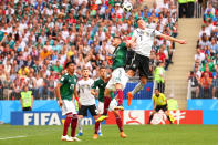 <p>Julian Draxler of Germany competes with Hector Moreno of Mexico during the 2018 FIFA World Cup Russia group F match between Germany and Mexico at Luzhniki Stadium on June 17, 2018 in Moscow, Russia. (Photo by Robbie Jay Barratt – AMA/Getty Images) </p>