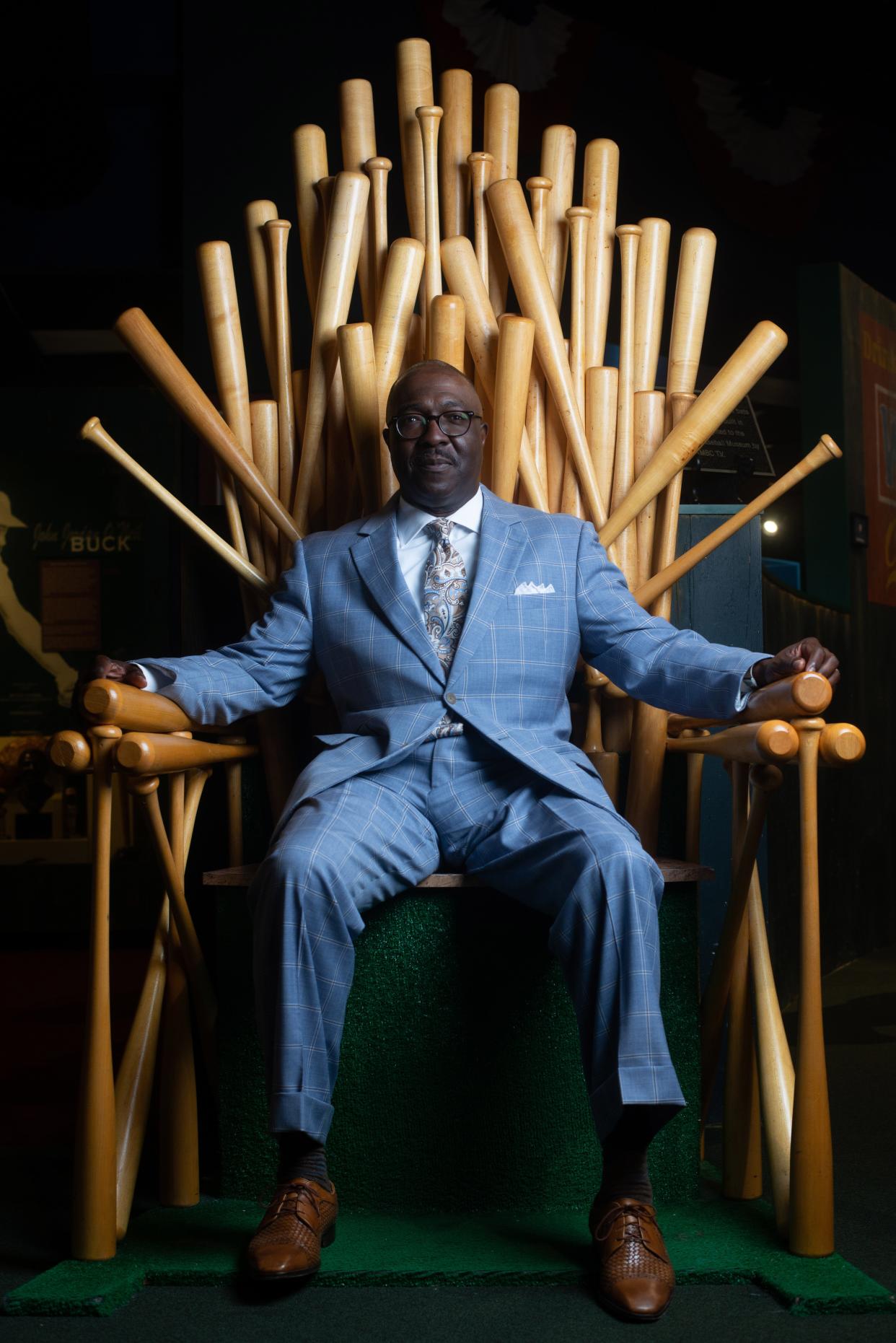 A chair made entirely out of Louisville Slugger baseball bats makes an ideal throne for Bob Kendrick, president of the Negro Leagues Baseball Museum in Kansas City, Mo.