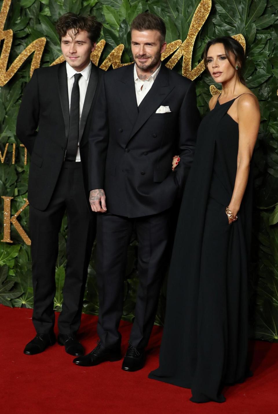 Brooklyn Beckham, David Beckham and Victoria Beckham at The Fashion Awards 2018 (AFP/Getty Images)