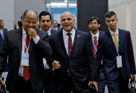 FILE PHOTO: Venezuela's Oil Minister and President of Venezuelan state-run oil company PDVSA Manuel Quevedo (C) arrives to attend the Petrotech conference in Greater Noida, India, February 11, 2019. REUTERS/Anushree Fadnavis/File Photo