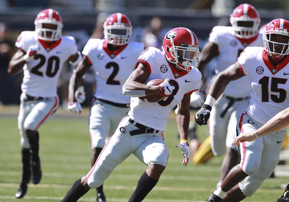 Georgia defensive back Tyson Campbell returns a Missouri fumble for a touchdown during the first half of an NCAA college football game, Saturday, Sept 22, 2018, in Columbia, Mo. (Curtis Compton/Atlanta Journal-Constitution via AP)