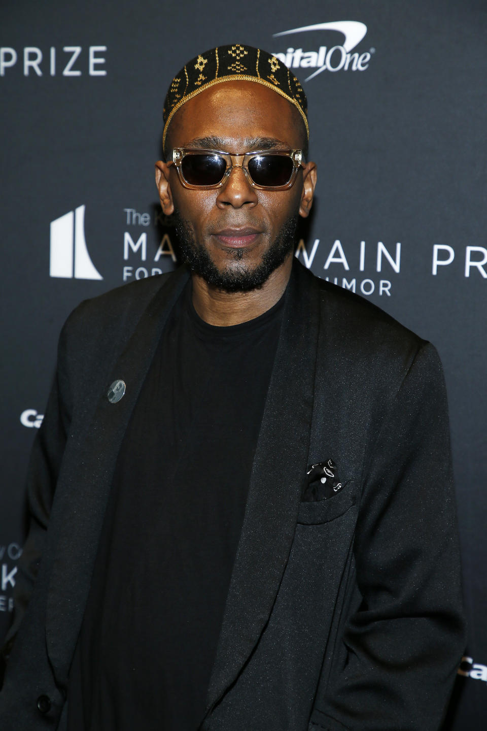 Yasiin Bey Wearing Hat And Sunglasses