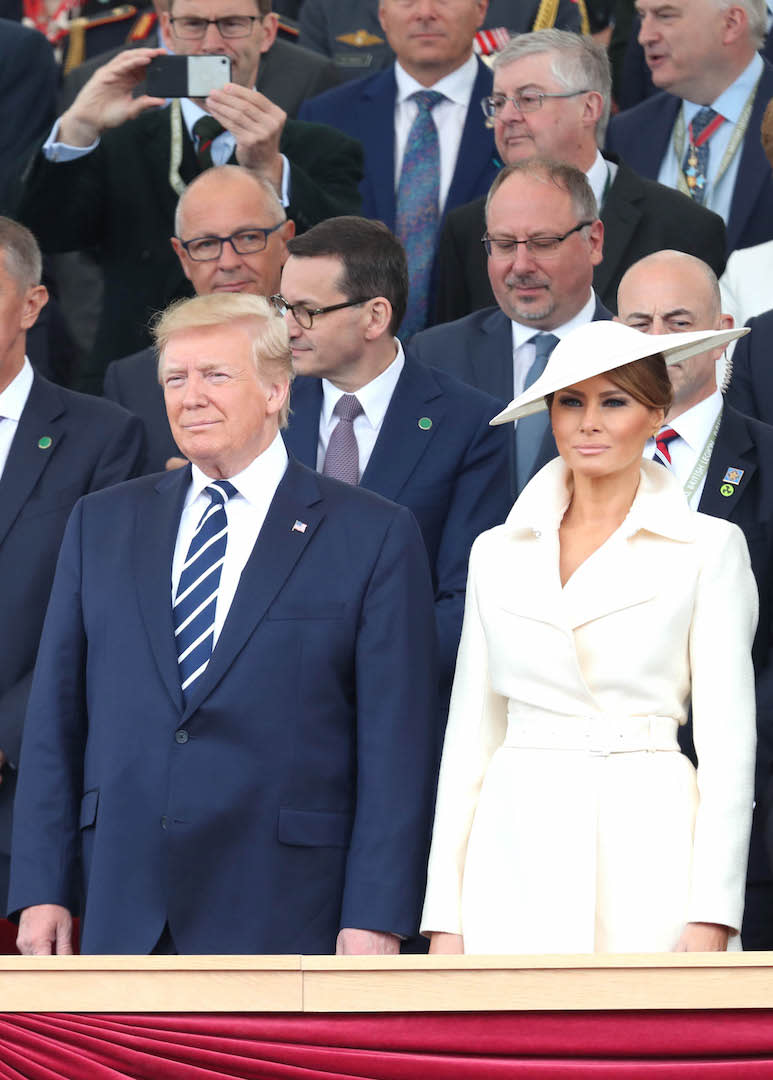 For their final day of the UK state visit in Portsmouth on June 5, Melania Trump opted for another all-cream ensemble in a belted coat by The Row and matching hat by the royal's go-to milliner, Philip Treacy. [Photo: Getty]