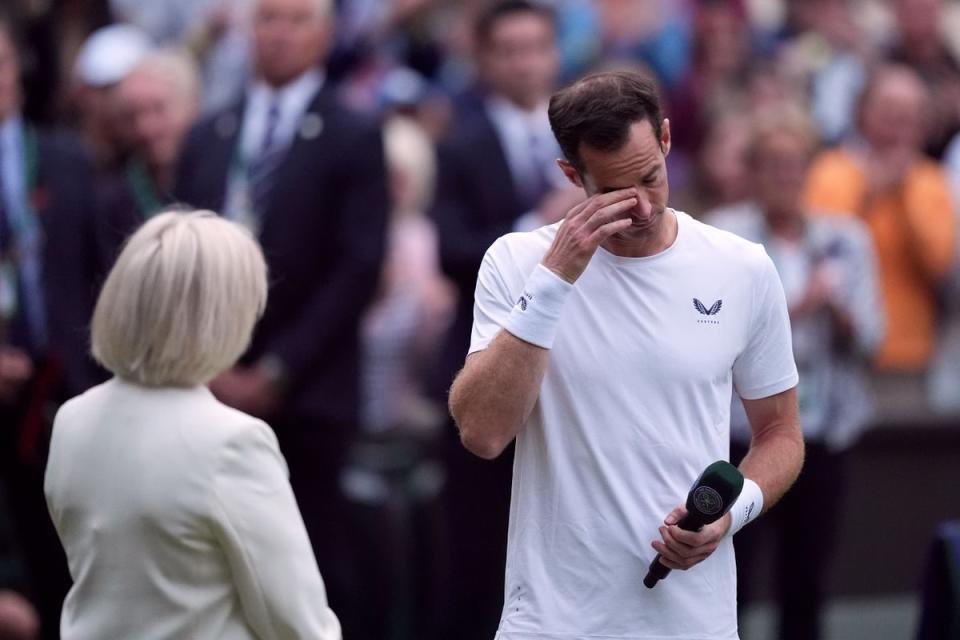 Andy Murray struggles to hold back the tears while talking to presenter Sue Barker after his Centre Court defeat  (PA Wire)