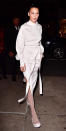 <p>Hadid stepped out in N.Y.C. to celebrate the launch of DKNY's spring/summer 2017 collection in a white skirt and sweater set and knee-high boots (get a similar pair from <a rel="nofollow noopener" href="http://click.linksynergy.com/fs-bin/click?id=93xLBvPhAeE&subid=0&offerid=390098.1&type=10&tmpid=8157&RD_PARM1=http%253A%252F%252Fshop.nordstrom.com%252Fs%252Fjohnston-murphy-darcy-tall-waterproof-wedge-boot-women%252F4365649%253Forigin%253Dcategory-personalizedsort%2526fashioncolor%253DBROWN%252520SUEDE&u1=ISNewsBellaHadidStreetStyle2.2JA" target="_blank" data-ylk="slk:Nordstrom;elm:context_link;itc:0;sec:content-canvas" class="link ">Nordstrom</a>). The model wore her brown hair in a slicked back ponytail and donned natural eye makeup featuring a shimmery pink lip. </p>