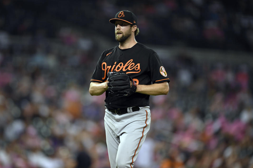 Baltimore Orioles starting pitcher Jordan Lyles walks to the dugout after being replaced by Logan Allen during the sixth inning of the team's baseball game against the Detroit Tigers, Friday, May 13, 2022, in Detroit. (AP Photo/Jose Juarez)