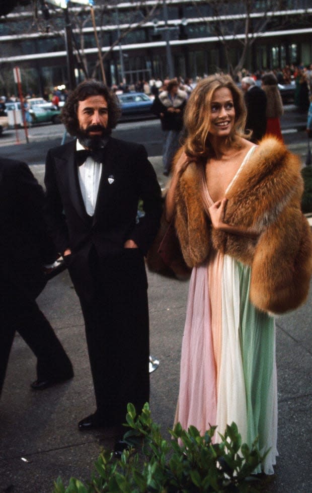 <p>Hutton's big, loose curls and flowing rainbow-colored Halston gown epitomized easy-going '70s glamour.</p>