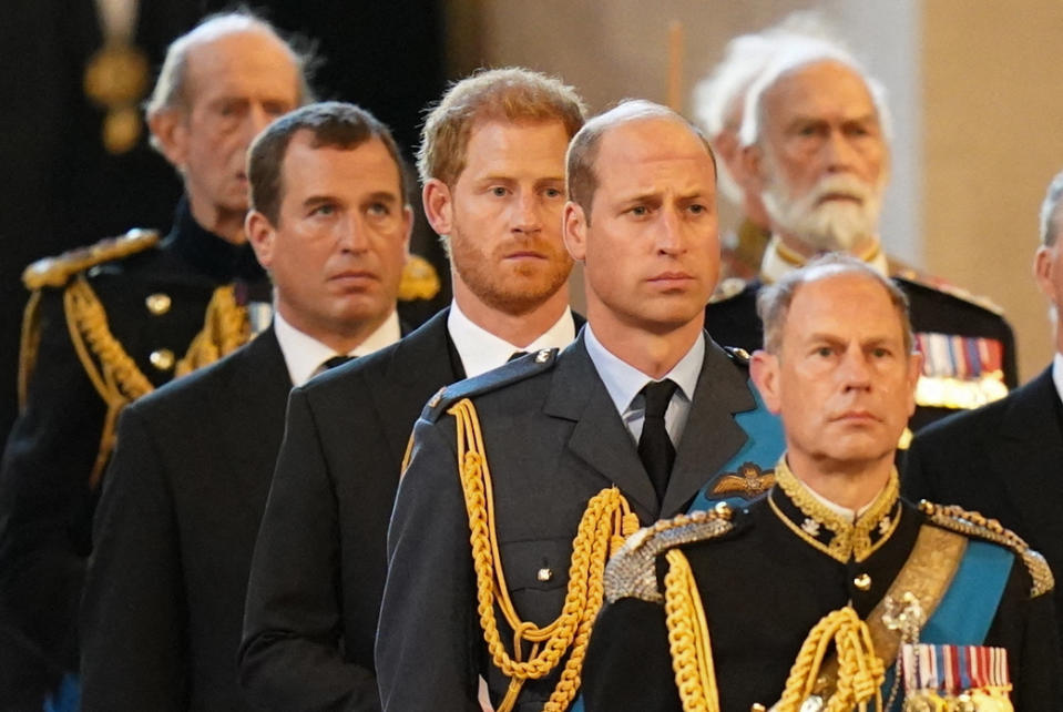 (L to R): Peter Phillips, Britain's Prince Harry, Duke of Sussex, Britain's Prince William, Prince of Wales and Britain's Prince Edward, Earl of Wessex, follow the pallbearers carrying of Queen Elizabeth II into Westminster Hall at the Palace of Westminster in London on September 14, 2022, to Lie in State following a procession from Buckingham Palace. Queen Elizabeth II will lie in state in Westminster Hall inside the Palace of Westminster, from Wednesday until a few hours before her funeral on Monday, with huge queues expected to file past her coffin to pay their respects. (Photo by Jacob King / POOL / AFP) (Photo by JACOB KING/POOL/AFP via Getty Images)