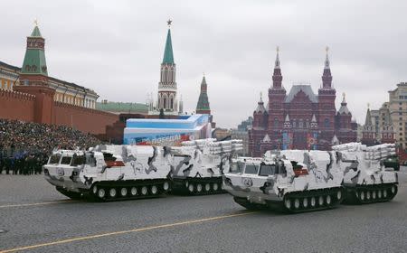 Russian servicemen parade with vehicles during the 72nd anniversary of the end of World War II on the Red Square in Moscow. REUTERS/Maxim Shemetov