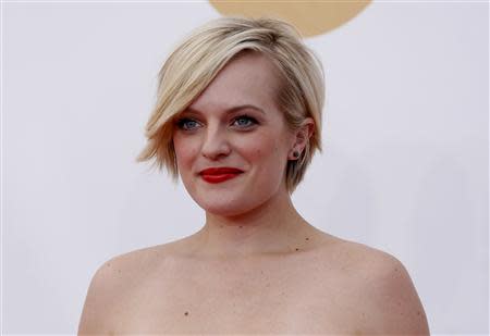 Actress Elizabeth Moss, from the AMC series "Mad Men," arrives at the 65th Primetime Emmy Awards in Los Angeles September 22, 2013. REUTERS/Mario Anzuoni (UNITED STATES - Tags: ENTERTAINMENT) (EMMYS-ARRIVALS)