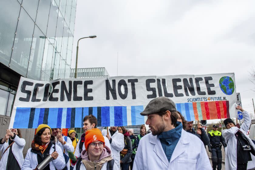 Scientists march through The Hague during the first scientist climate march in The Netherlands.