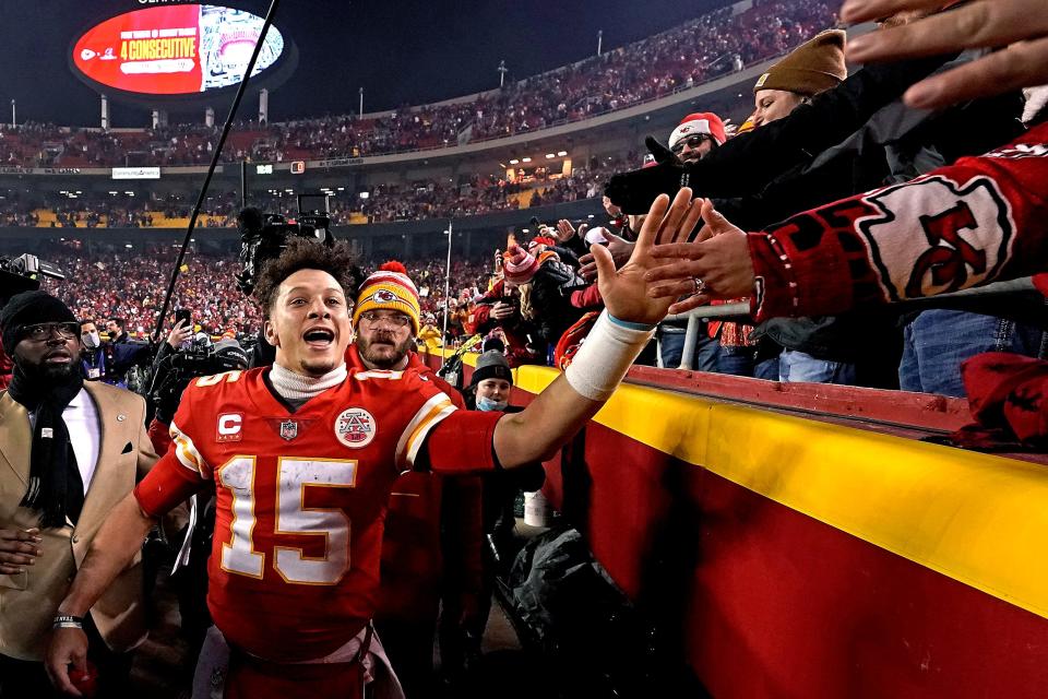 Kansas City Chiefs quarterback Patrick Mahomes (15) celebrates with fans after an NFL divisional round victory over the Buffalo Bills. The Chiefs trailed with 13 seconds left but forced overtime and won 42-36 to advance to the AFC Championship for the fourth straight season.