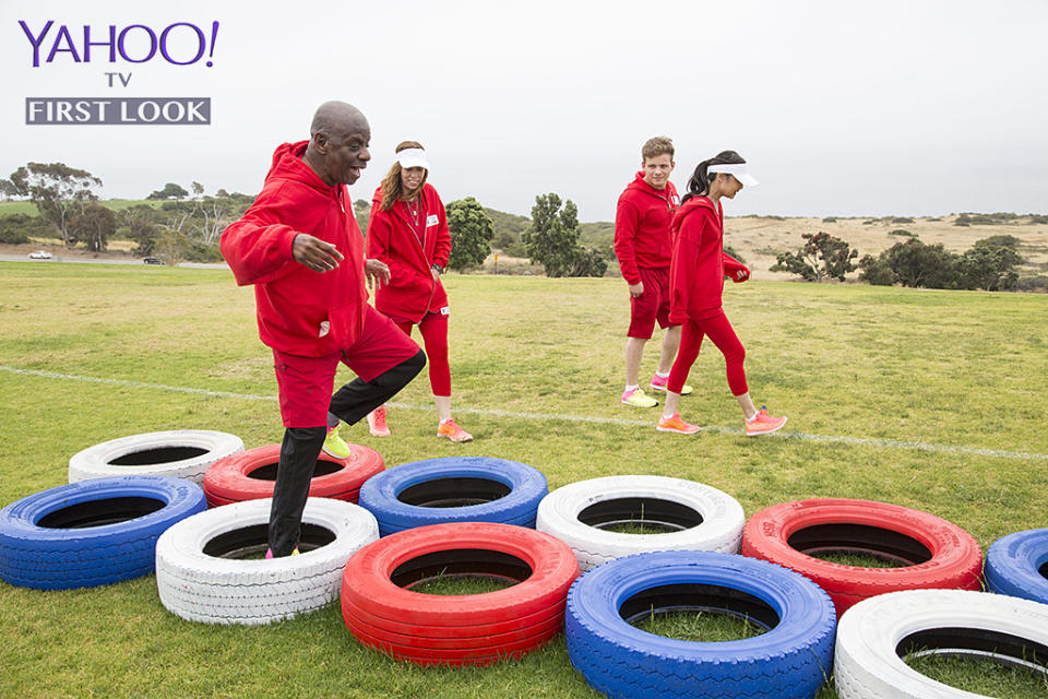 <p>Walker (<em>Good Times</em>) runs through tires as the rest of Team TV Kids cheers him on.<br><br>(Photo Credit: Kelsey McNeal/ABC) </p>