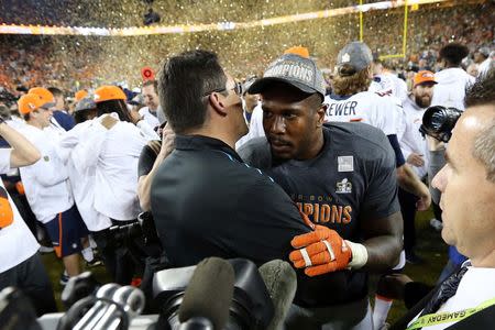 Feb 7, 2016; Santa Clara, CA, USA; Denver Broncos outside linebacker Von Miller (58) greets Carolina Panthers head coach Ron Rivera after Super Bowl 50 at Levi's Stadium. Mandatory Credit: Matthew Emmons-USA TODAY Sports