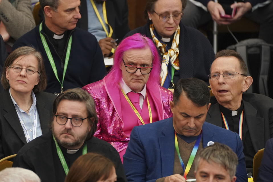 Members of the Church of England's Synod, gather at the General Synod of the Church of England, at Church House in central London, to consider a motion which reviews the church's failure "to be welcoming to LGBTQI+ people" and the harm they have faced and still experience, in London, Thursday, Feb. 9, 2023. (James Manning/PA via AP)