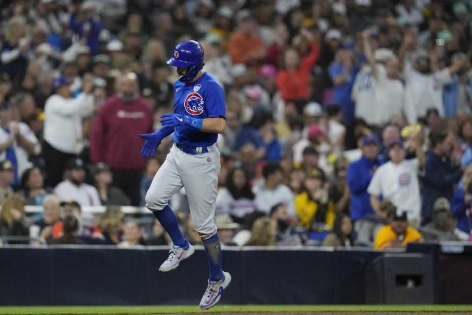 Chicago Cubs' Dansby Swanson rounds the bases after hitting a home run during the fifth inning of a baseball game against the San Diego Padres, Friday, June 2, 2023, in San Diego. (AP Photo/Gregory Bull)
