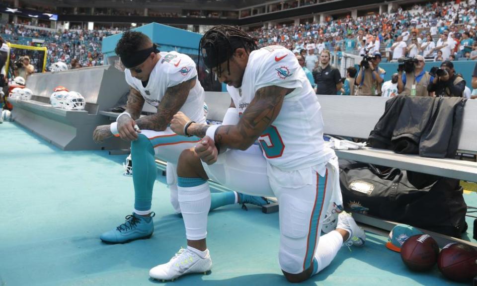 Kenny Stills and Albert Wilson knelt before the Miami Dolphins season opener on Sunday