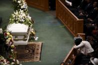 A member of the family reacts during Freddie Gray's funeral service at New Shiloh Baptist Church in Baltimore April 27, 2015. REUTERS/Sait Serkan Gurbuz