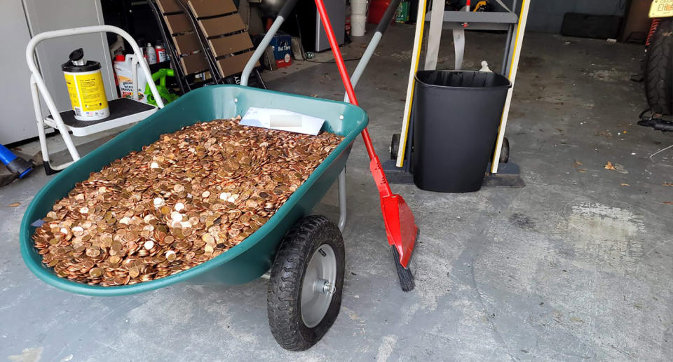 A wheelbarrow full of pennies