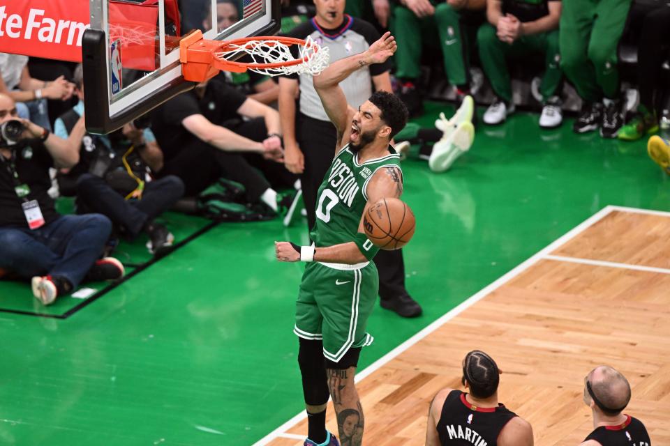 Jayson Tatum reacts after a shot against Miami in the first quarter during Game 5 of the Eastern Conference finals.