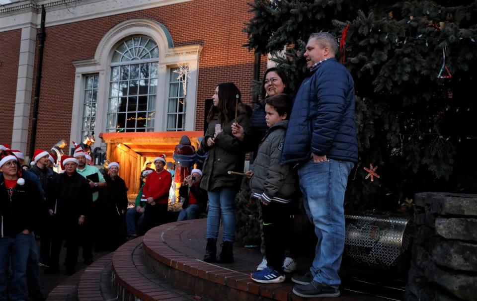 David Uhl, along with his daughter Samantha, wife Perla and son Ethan, get ready to light the Christmas tree in downtown Lancaster for the 10th Annual WinterFest and Tree Lighting Saturday, Dec. 4.