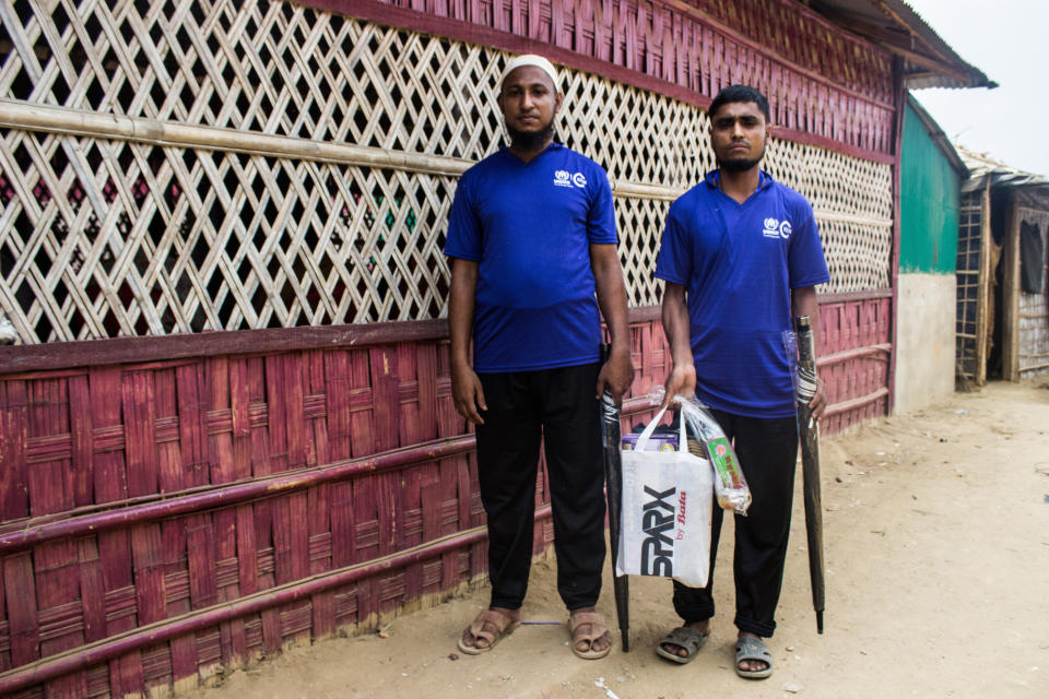 Elephant response team volunteers Jahid Hossain (left) and Mohammed Yahea (right) with equipment given to them&nbsp;by IUCN. (Photo: Kazi Riasat Alve for HuffPost)