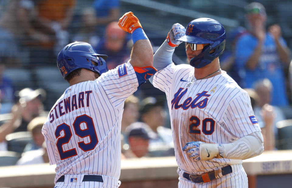 New York Mets' DJ Stewart (29) celebrates with teammate Pete Alonso (20) after his home run against the Seattle Mariners during the seventh inning of a baseball game, Sunday, Sept. 3, 2023, in New York. (AP Photo/Noah K. Murray)