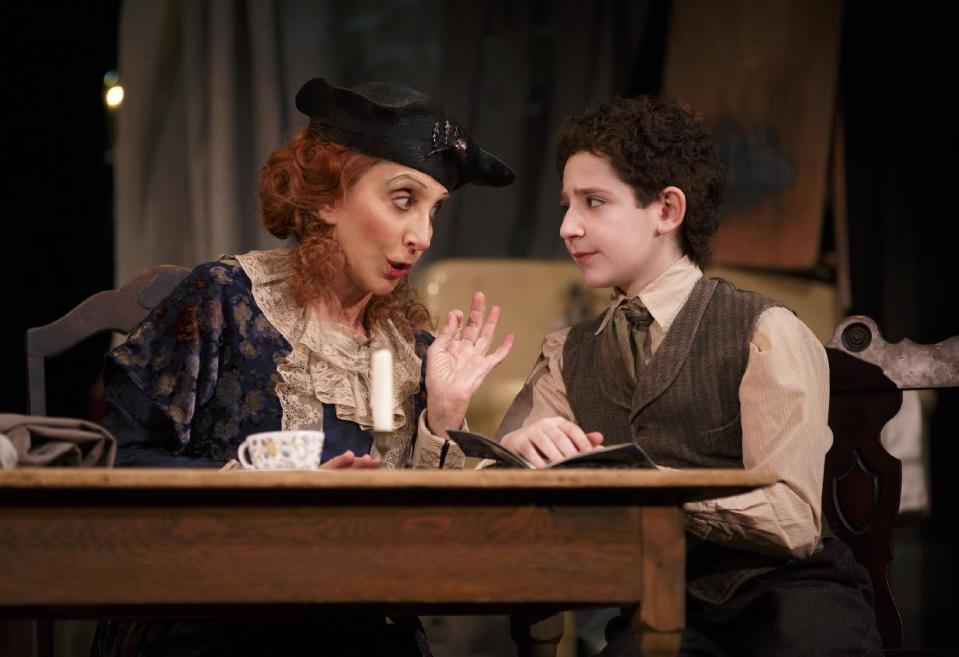 This image released by Lincoln Center Theater shows Andrea Martin, left, and Matthew Schechter in a scene from "Act One," at the Vivian Beaumont Theater in New York. (AP Photo/Lincoln Center Theater, Joan Marcus)