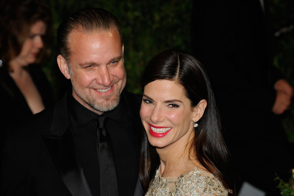 Jesse James and Actress Sandra Bullock arrive at the 2010 Vanity Fair Oscar Party hosted by Graydon Carter held at Sunset Tower on March 7, 2010 in West Hollywood, California.  (Photo by Ethan Miller/WireImage) 