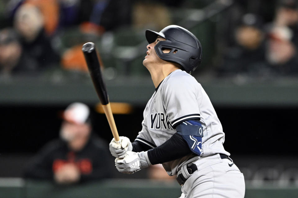 New York Yankees' Anthony Volpe follows through on a triple against the Baltimore Orioles in the fifth inning of a baseball game on Saturday, April 8, 2023, in Baltimore. (AP Photo/Gail Burton)