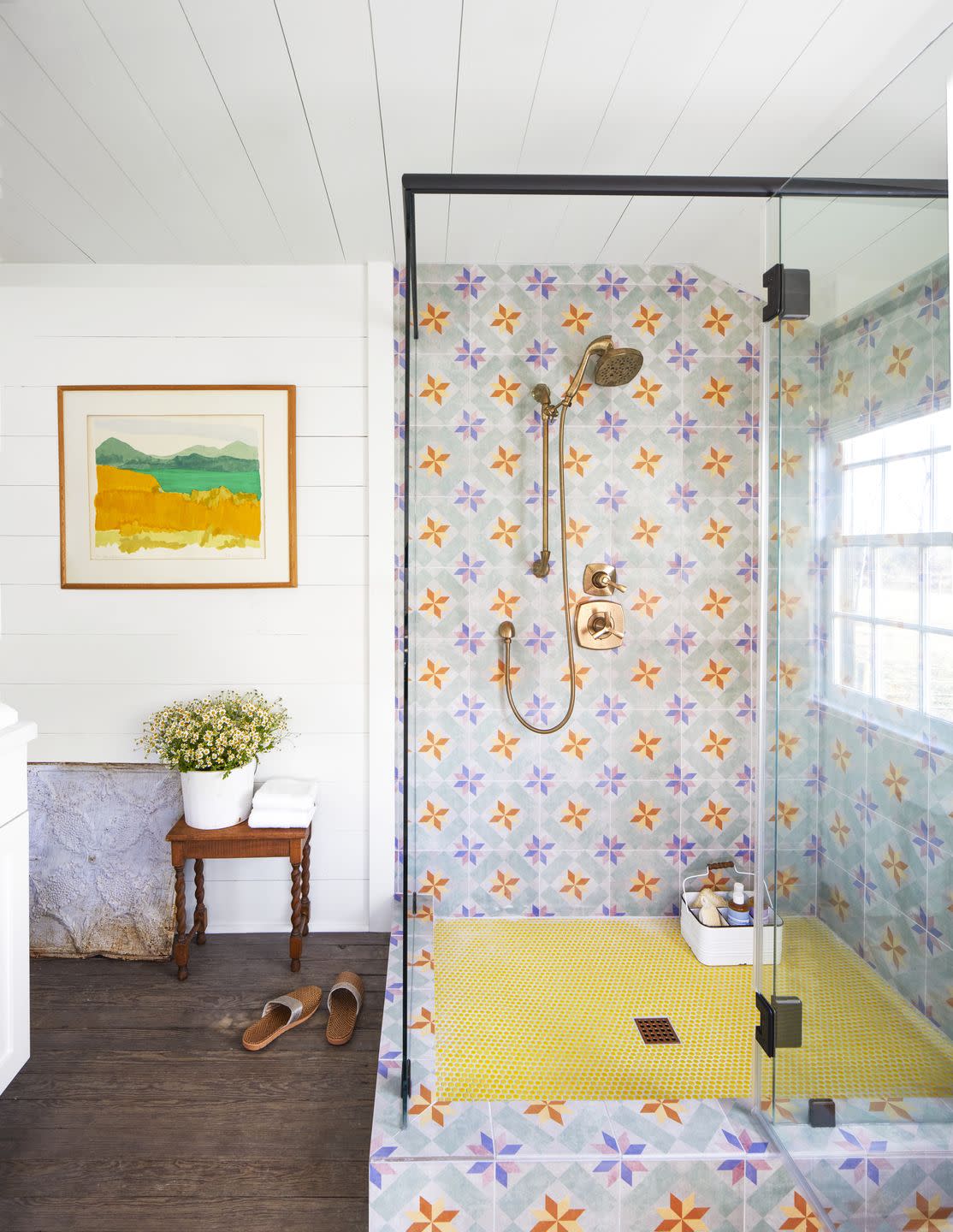 farmhouse shower with colorful tile in shower