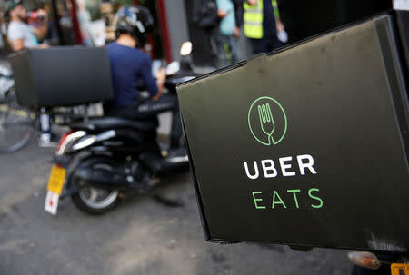 An UberEATS food delivery scooter is seen parked in London, Britain September 7, 2016. Picture taken September 7, 2016. REUTERS/Neil Hall