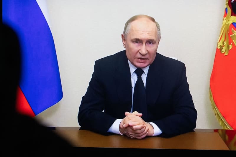 Russian President Vladimir Putin pictured on a tv screen while addressing the country's citizens after the terrorist attack at Crocus City Hall. On the evening of March 22, ISIS militants attacked the building of the Crocus City Hall concert hall in Moscow. The death toll at Crocus City Hall currently stands at 133 people. Artem Priakhin/SOPA Images via ZUMA Press Wire/dpa