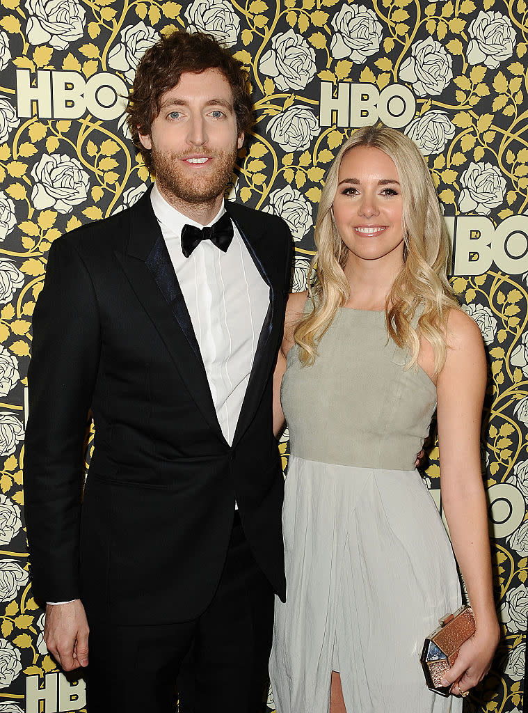 Thomas Middleditch in a black tuxedo and Mollie Gates in a sleeveless dress smiling at an HBO event